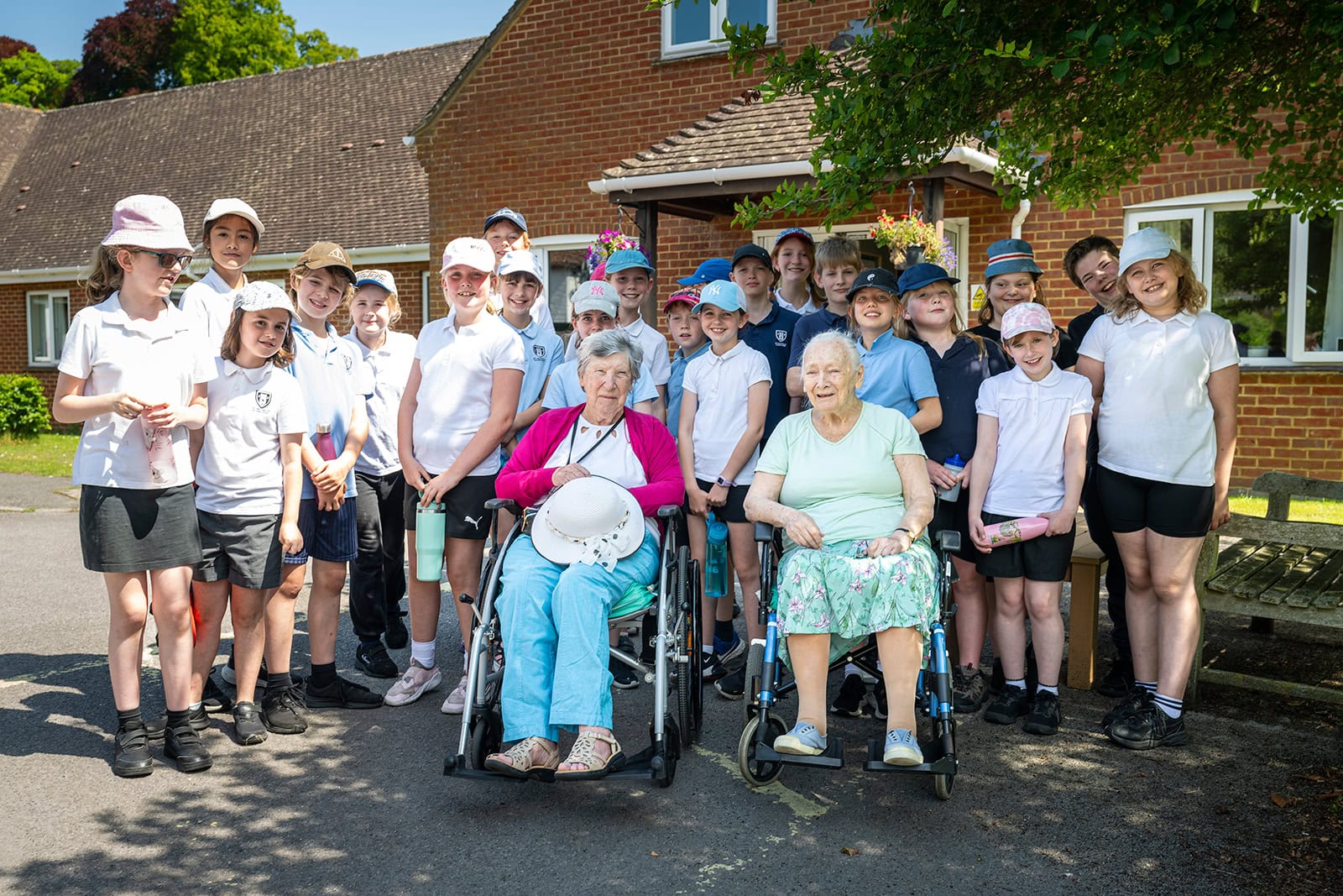 Outside Aldbourne Nursing Home with children from the school.